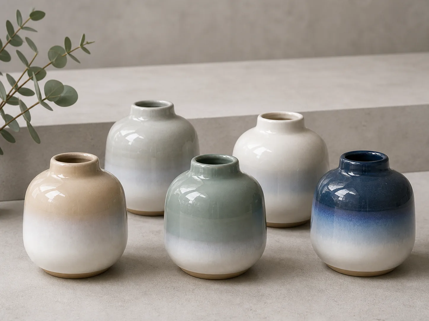 Gradient-glaze ceramic vases in pastel and deep blue tones for seasonal gifting